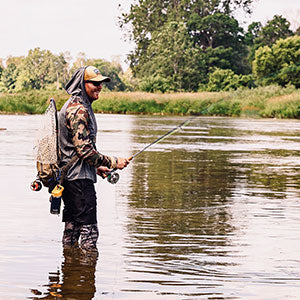 Jamie holding a rod