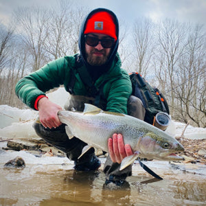 Kennan holding a fish